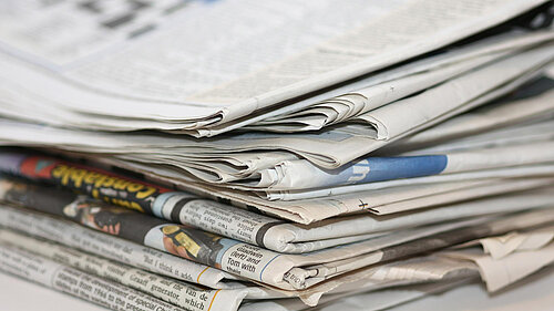 A group of newspapers.