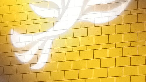 Lib Dem logo bird projected on blockwork