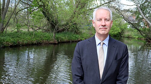 Taunton and Wellington MP Gideon Amos at the River Tone